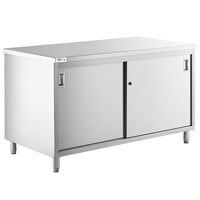 Regency 30 inch x 60 inch 16 Gauge Type 304 Stainless Steel Enclosed Base Table with Sliding Doors and Adjustable Midshelf
