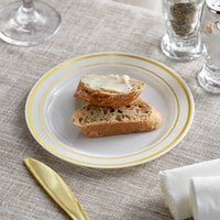 Visions 6 inch Bone / Ivory Plastic Plate with Gold Bands - 150/Case
