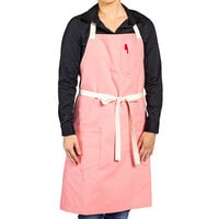 Uncommon Chef 3115 Coral Pink Customizable 100% Cotton Canvas Vibe Bib Apron with Natural Webbing and 3 Pockets - 34" x 36"