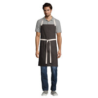 Uncommon Threads 3115 Dark Brown Customizable 100% Cotton Canvas Vibe Bib Apron with Natural Webbing and 3 Pockets - 34 inchL x 36 inchW