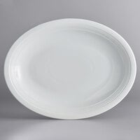 Acopa Capri 13 3/4" x 10 1/2" Coconut White Oval Stoneware Coupe Platter - 12/Case