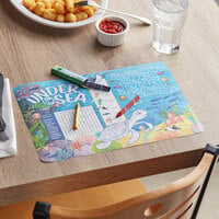 Choice 10 inch x 14 inch Kids Under the Sea Themed Interactive Placemat with 3 Pack Triangular Kids' Restaurant Crayons - 1000/Case