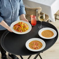 Choice 31 inch x 23 inch Black Oval Non-Skid Serving Tray