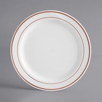 Gold Visions 7 inch White Plastic Plate with Rose Gold Bands - 15/Pack