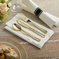 Gold Visions 18 inch x 15 1/2 inch Pre-Rolled Linen-Feel White Napkin and Hammersmith Heavy Weight Gold Plastic Cutlery Set - 100/Case