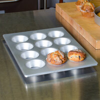 12 Cup 5 oz. Glazed Aluminized Steel Jumbo Muffin / Cupcake Pan - 12 7/8 inch x 17 7/8 inch