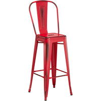 Lancaster Table & Seating Alloy Series Distressed Red Metal Indoor / Outdoor Industrial Cafe Barstool with Vertical Slat Back and Drain Hole Seat