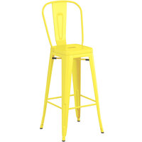 Lancaster Table & Seating Alloy Series Yellow Metal Indoor / Outdoor Industrial Cafe Barstool with Vertical Slat Back and Drain Hole Seat