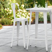 Lancaster Table & Seating Alloy Series White Metal Indoor / Outdoor Industrial Cafe Barstool with Vertical Slat Back and Drain Hole Seat