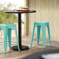 Lancaster Table & Seating Alloy Series Seafoam Stackable Metal Indoor / Outdoor Industrial Cafe Counter Height Stool with Drain Hole Seat