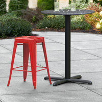 Lancaster Table & Seating Alloy Series Red Stackable Metal Indoor / Outdoor Industrial Cafe Counter Height Stool with Drain Hole Seat
