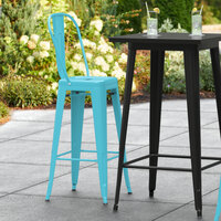 Lancaster Table & Seating Alloy Series Arctic Blue Metal Indoor / Outdoor Industrial Cafe Barstool with Vertical Slat Back and Drain Hole Seat
