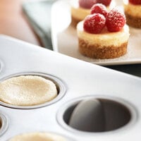 Fox Run 4862 12 Mold Non-Stick Carbon Steel Mini Cheesecake Pan with Removable Bottom - 13 7/8 inch x 10 5/8 inch