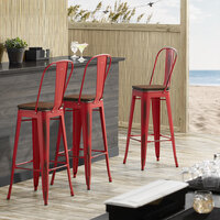Lancaster Table & Seating Alloy Series Distressed Red Metal Indoor Industrial Cafe Bar Height Stool with Vertical Slat Back and Walnut Wood Seat