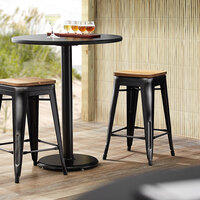 Lancaster Table & Seating Alloy Series Distressed Black Metal Indoor Industrial Cafe Counter Height Stool with Natural Wood Seat