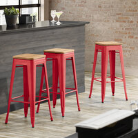 Lancaster Table & Seating Alloy Series Red Metal Indoor Industrial Cafe Bar Height Stool with Natural Wood Seat