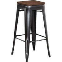 Lancaster Table & Seating Alloy Series Distressed Black Metal Indoor Industrial Cafe Bar Height Stool with Walnut Wood Seat