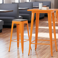 Lancaster Table & Seating Alloy Series Orange Metal Indoor Industrial Cafe Bar Height Stool with Black Wood Seat