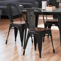 Lancaster Table & Seating Alloy Series Black Indoor Cafe Chair with Walnut Wood Seat