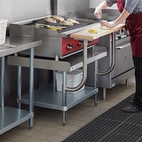 Regency 30 inch x 36 inch 16-Gauge Stainless Steel Equipment Stand with Galvanized Undershelf and 10 inch Wooden Adjustable Cutting Board