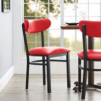 Lancaster Table & Seating Boomerang Black Finish Chair with 2 1/2 inch Red Vinyl Padded Seat and Back