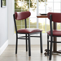 Lancaster Table & Seating Boomerang Black Finish Chair with 2 1/2 inch Burgundy Vinyl Padded Seat and Back