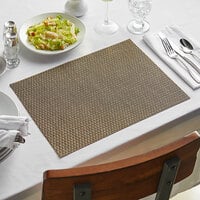 Front of the House XPM022BEV83 Metroweave 16 inch x 12 inch Beige Rattan Woven Vinyl Rectangle Placemat - 12/Pack