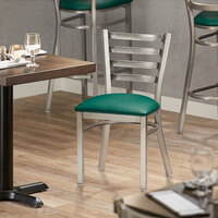 Lancaster Table & Seating Clear Frame Ladder Back Cafe Chair with Green Padded Seat - Detached Seat