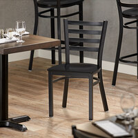 Lancaster Table & Seating Black Finish Metal Ladder Back Cafe Chair with Black Wood Seat - Detached Seat