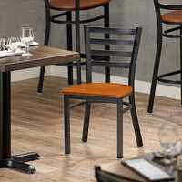Lancaster Table & Seating Black Finish Metal Ladder Back Cafe Chair with Cherry Wood Seat - Detached Seat