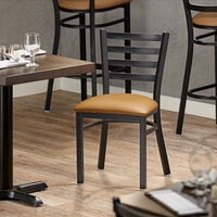 Lancaster Table & Seating Black Finish Metal Ladder Back Cafe Chair with Light Brown Padded Seat - Detached Seat