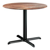Lancaster Table & Seating Excalibur 36" Round Standard Height Table with Textured Yukon Oak Finish and Cross Base Plate