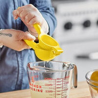 Choice 8 inch Yellow Handheld Aluminum Lemon Juicer / Squeezer