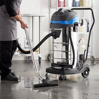 Lavex Janitorial 26 Gallon Stainless Steel Industrial Wet / Dry Vacuum with Toolkit - 100-120V, 1400W