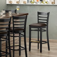 Lancaster Table & Seating Black Ladder Back Bar Height Chair with Dark Brown Padded Seat - Detached Seat