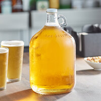 Acopa 128 oz. Customizable Clear Growler with Cap - 4/Case