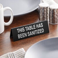 Cal-Mil 22139-62 6 inch x 2 inch Black This Table Has Been Sanitized Table Tent Sign