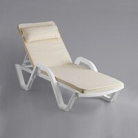 Lancaster Table & Seating White Stacking Adjustable Resin Chaise with Cream Cushion and Pillow