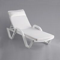 Lancaster Table & Seating White Stacking Adjustable Resin Chaise with White Cushion and Pillow