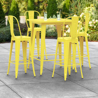 Lancaster Table & Seating Alloy Series 32 inch x 32 inch Yellow Outdoor Bar Height Table with 4 Metal Cafe Bar Stools