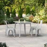 Lancaster Table & Seating Alloy Series 47 1/2 inch x 29 1/2 inch Silver Standard Height Outdoor Table with 4 Cafe Chairs