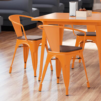 Lancaster Table & Seating Alloy Series Orange Metal Indoor Industrial Cafe Arm Chair with Vertical Slat Back and Walnut Wood Seat