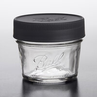 Ball 1440086001 4 oz. Regular Mouth Smooth Sided Glass Canning Jar with Black Plastic Leak-Proof Lid   - 4/Pack