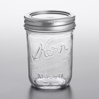 Kerr 501ZFP 8 oz. Half-Pint Regular Mouth Glass Canning Jar with Silver Metal Lid and Band - 12/Case