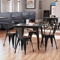 Lancaster Table & Seating Alloy Series 36" x 36" Black Standard Height Indoor Table and 4 Arm Chairs with Walnut Wood Seats