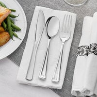 Hoffmaster 119978 CaterWrap 17 inch x 17 inch Pre-Rolled Scroll Linen-Like White Napkin and Metallic Silver Heavy Weight Plastic Cutlery Set - 100/Case