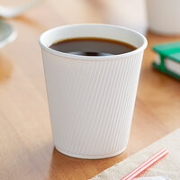 Choice 10 oz. Double Wall Ripple White Paper Hot Cup - 500/Case