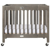Foundations 2131480 Boutique 24 inch x 38 inch Dapper Gray Compact Slatted Wood Folding Crib with Oversized Casters and 3 inch InfaPure Mattress