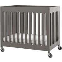 Foundations Boutique 24 inch x 38 inch Dapper Gray Compact Slatted Wood Folding Crib with Oversized Casters and 3 inch InfaPure Mattress