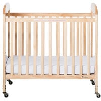 Foundations 2533040 Serenity 24 inch x 38 inch Natural Compact Fixed-Side Clearview / Mirror Wood Crib with Adjustable Mattress Board and 3 inch InfaPure Mattress